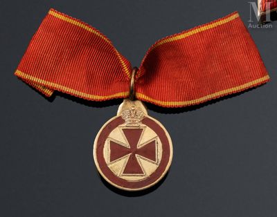 an image of a medal with a red ribbon on a black background