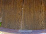 a wooden table with a clock on top of it
