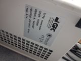 a close up of a white refrigerator with a label on it