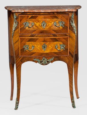 an antique wooden chest of drawers with a marble top