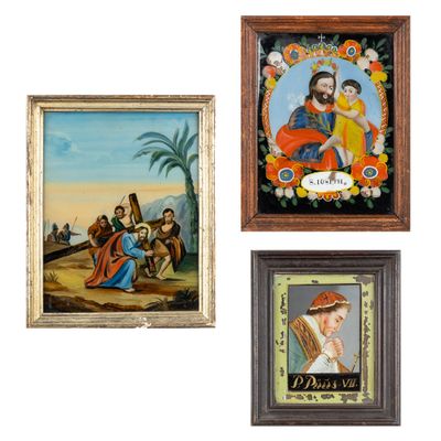 three framed pictures of jesus and other religious paintings on a wall
