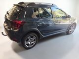 a picture of a black car parked in a white room