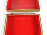 pair of red wooden boxes on white background with one open and the other closed