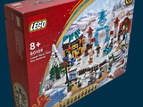 a box that has a toy train set in it