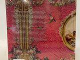 the back cover of a book with a picture of a woman in a pink room