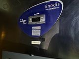 a picture of a machine with a clock on the side of it
