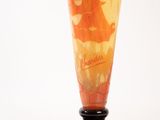 a vase that has a picture of a man on it
