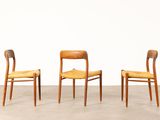 three wooden chairs with woven seats in a white room