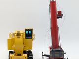 a yellow crane next to a red crane on a white background