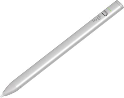 a close up of a white pen with a green marker on it