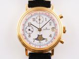 une montre-bracelet en or avec un cadran blanc et un bracelet noir