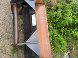an overhead view of an old tv sitting on the ground next to a bush