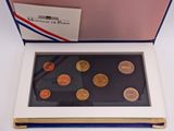 an image of a box with a few coins inside of it