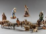 many figurines of people and animals in a circle