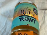 a bottle of rum on a table with a price tag on it
