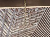 a picture of a picture of a very tall building with a lot of windows