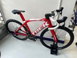 a bike that is sitting on a stand in a room