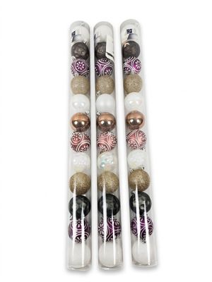 three clear tubes filled with different colored ornaments on top of a white surface