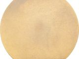 a close up of a gold plate on a white background