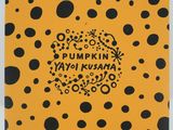 a box with a black and yellow polka dot pattern on it
