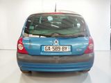 a picture of a blue car parked in a showroom