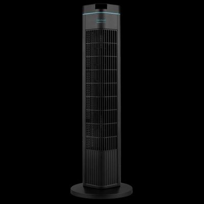 un ventilateur colonne noir posé sur une table noire