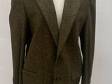 an image of a suit on a mannequin stand
