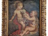 un vieux tableau représentant un bébé tenant un ours en peluche, dans un cadre doré