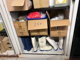 a small refrigerator with many boxes of items inside of it