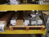 many boxes on the shelves in the warehouse