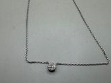 silver plated necklace with a heart pendant on a chain