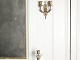 an image of a room with a dresser and a mirror