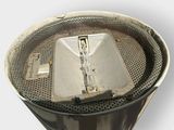 a close up of a metal trash can with a metal lid