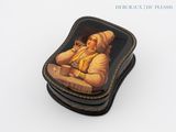 a picture of a decorative box with a picture of a woman