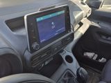 a car dashboard with a monitor in the middle of it