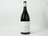 a bottle of wine that is sitting on a table