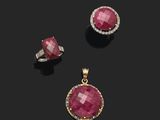 three ruby and diamond pendants