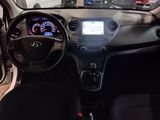 a dashboard of a small car with a digital display