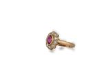 an oval ruby and diamond ring