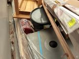 a lot of boxes and boxes on the floor in a warehouse