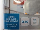 a picture of a box with a stuffed penguin on it
