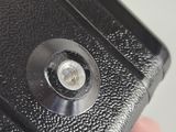 a close up of a person ' s hand holding a cell phone