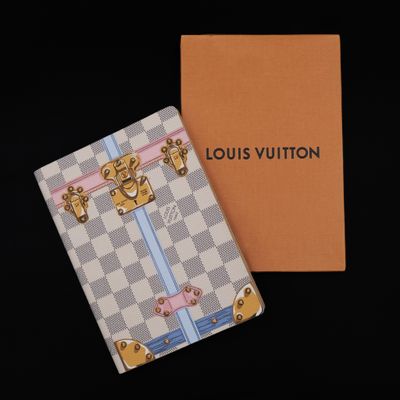 louis vuitton passport cover in white and pink checkered with gold hardware