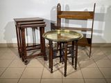 two tables and a chair in a room