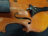 a violin that has been left on the table