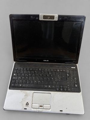 a laptop computer that is sitting on a table