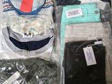 a box full of clothing that is sitting on a table