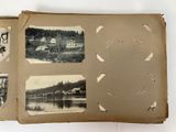 an old photo of a book with pictures on it