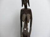 statue of a woman holding a baby in her arms