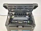 a printer that is sitting on top of a table